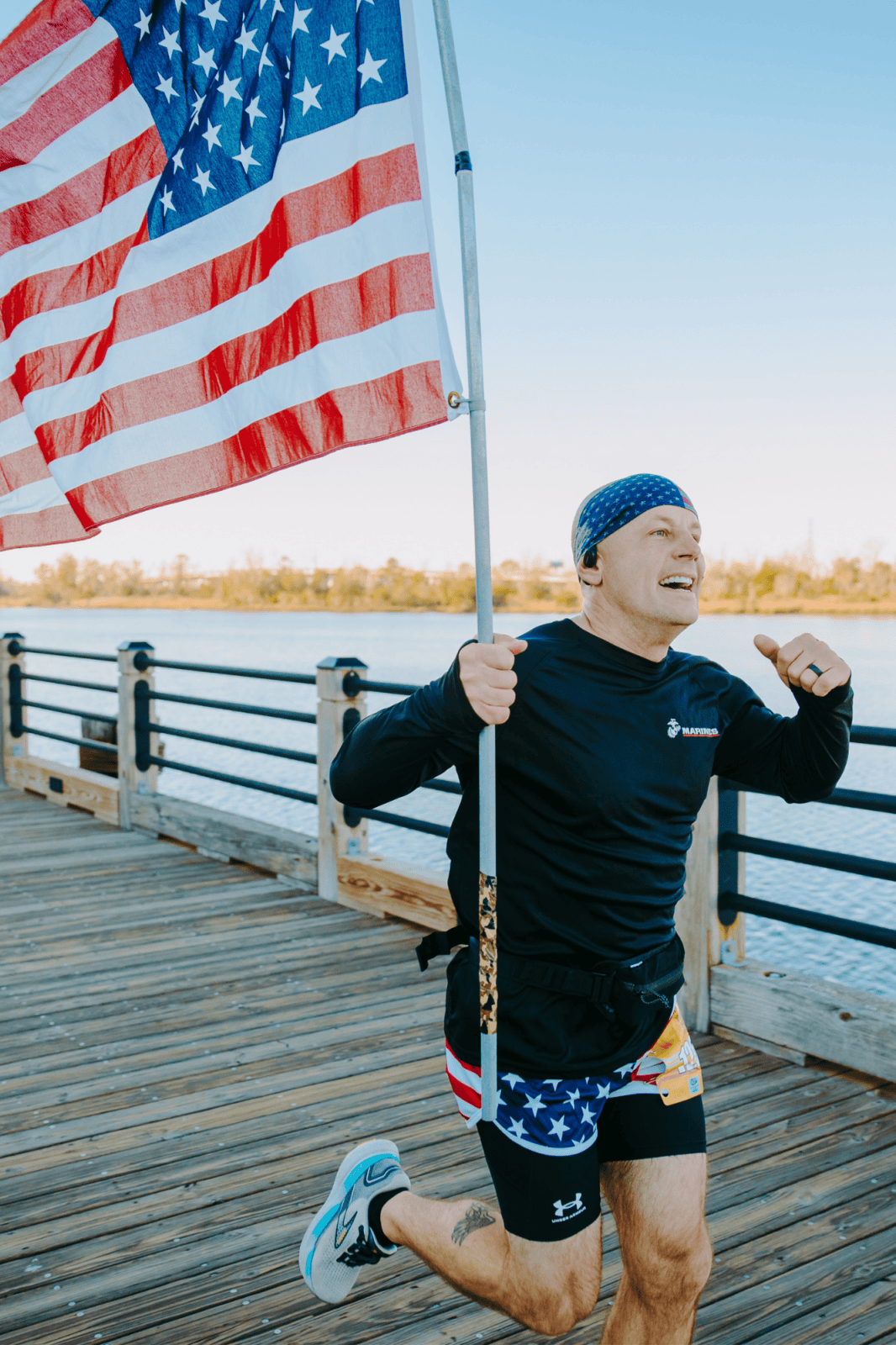 Man running with American Flag